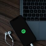 mobile phone, headphones, spotify, smartphone, cellphone, music service, music, social media, entertainment, podcast, laptop, macbook, technology, spotify, spotify, spotify, spotify, spotify